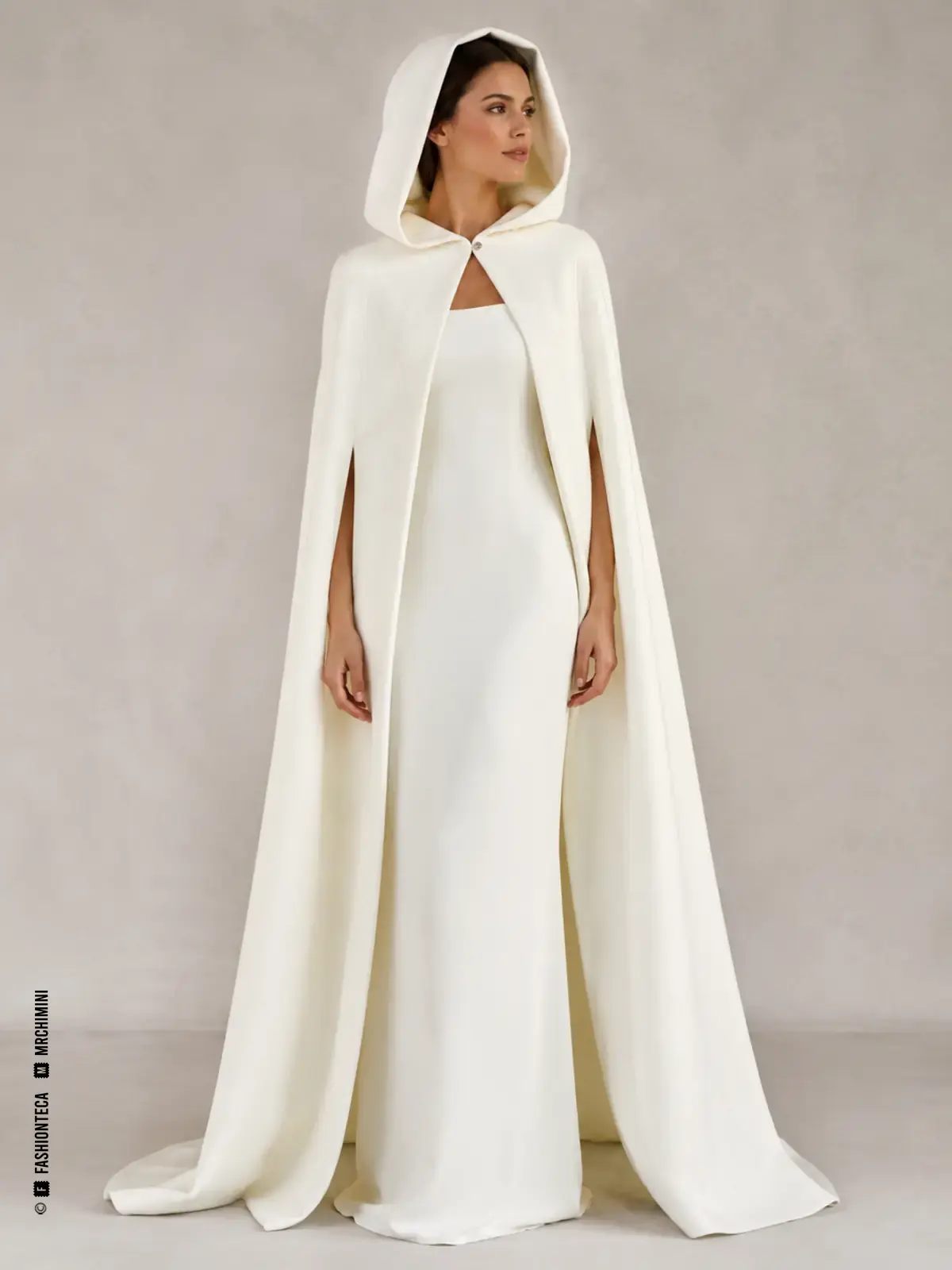 CAPA NUPCIAL CON CAPUCHA — Abrigo y Superposición Nupcial Novia con capa blanca larga y capucha amplia colocada sobre la cabeza.