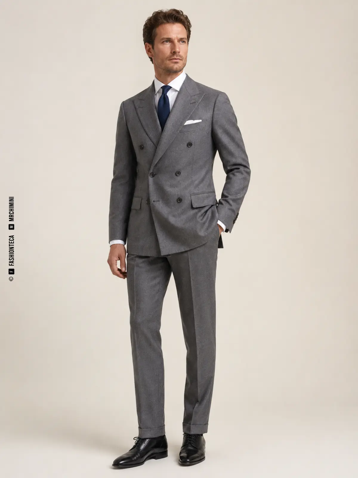 hombre con traje cruzado gris de seis botones y solapas de pico